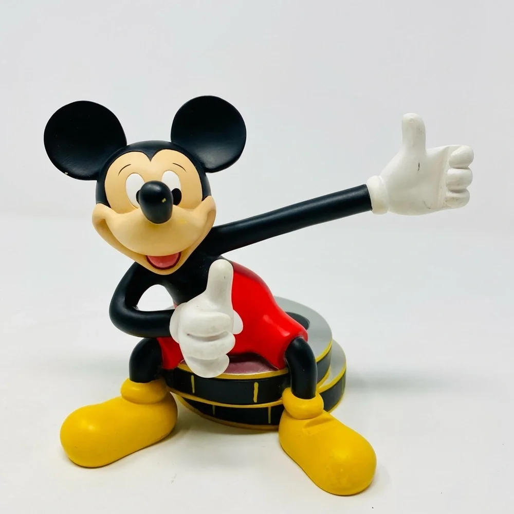 VINTAGE DISNEY, OVERLAND PARK KS66214 MICKEY SITTING ON FILM REELS